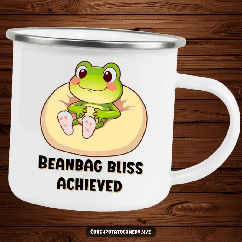 Funny frog character in fuzzy slippers sinking into a beanbag chair, enamel camping mug.