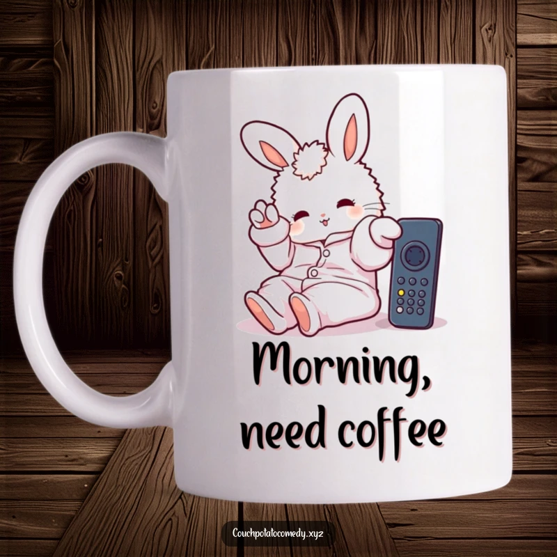 Funny mug with a fluffy bunny in oversized pajamas, lazily stretching a paw towards a TV remote, embodying ultimate couch potato relaxation.