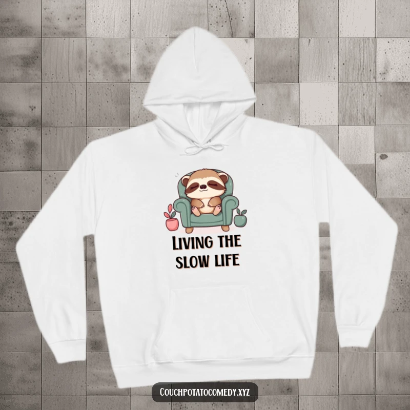 Funny sloth relaxation hoodie, featuring a sleepy sloth sighing contentedly in a tiny armchair, perfect for ultimate comfort.