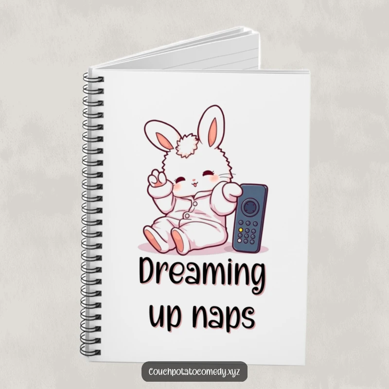 Funny notebook with a fluffy bunny in oversized pajamas, lazily stretching a paw towards a remote, perfect for notes and doodles.